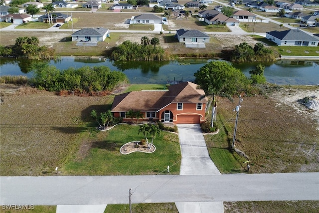 321 NW 19th Ter, Cape Coral, FL 33993 - aerial perspective of suburban area featuring a large body of water