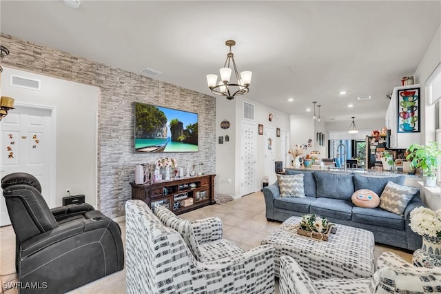 4558 Lamaida Ln, Ave Maria, FL 34142 - living area featuring an inviting chandelier, light tile patterned floors, recessed lighting, and visible vents