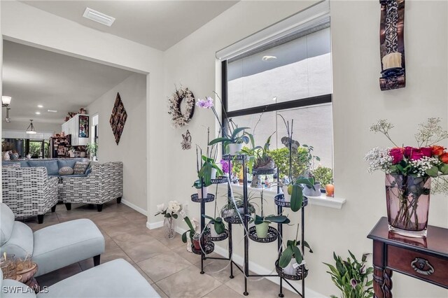 4558 Lamaida Ln, Ave Maria, FL 34142 - corridor featuring tile patterned floors, baseboards, and visible vents