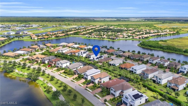 4558 Lamaida Ln, Ave Maria, FL 34142 - drone / aerial view with a water view and a residential view