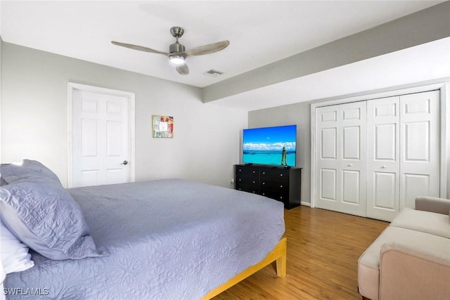 387 S Heathwood Dr, Marco Island, FL 34145 - bedroom with a closet, a ceiling fan, visible vents, and wood finished floors