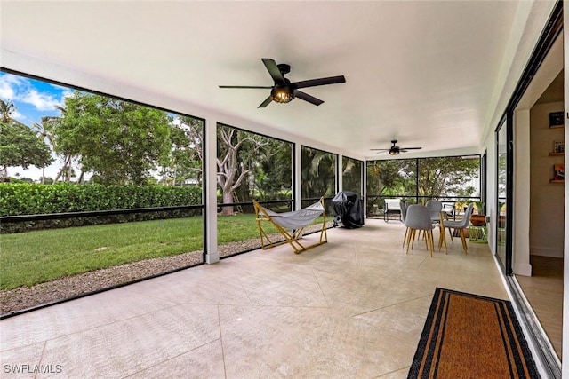 387 S Heathwood Dr, Marco Island, FL 34145 - unfurnished sunroom with a ceiling fan