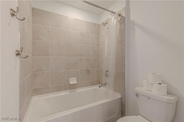 18707 Ivywood Pl, Estero, FL 33928 - full bathroom featuring washtub / shower combination and toilet