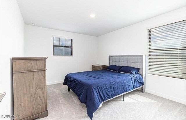 18707 Ivywood Pl, Estero, FL 33928 - bedroom featuring carpet floors and baseboards