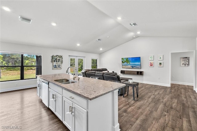 490 Windermere Dr, Lehigh Acres, FL 33972 - kitchen with french doors, stainless steel dishwasher, a sink, visible vents, and a kitchen island with sink