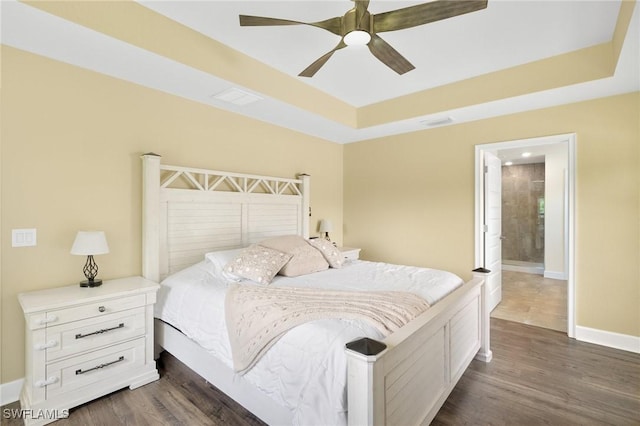 490 Windermere Dr, Lehigh Acres, FL 33972 - bedroom with a raised ceiling, dark wood-type flooring, baseboards, and ceiling fan