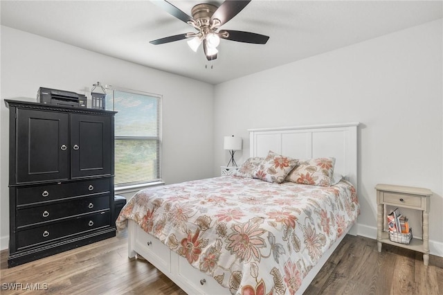 490 Windermere Dr, Lehigh Acres, FL 33972 - bedroom with baseboards, wood finished floors, and a ceiling fan