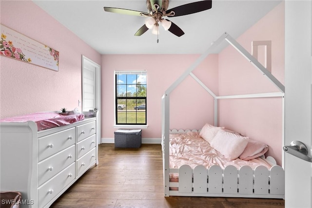 490 Windermere Dr, Lehigh Acres, FL 33972 - bedroom with baseboards, ceiling fan, and hardwood / wood-style floors