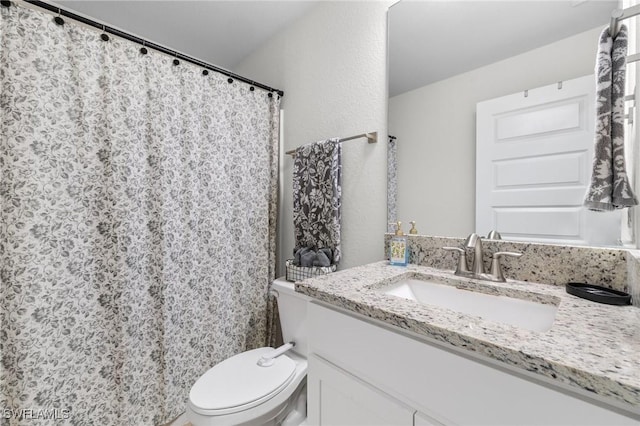 490 Windermere Dr, Lehigh Acres, FL 33972 - full bathroom with a shower with curtain, toilet, and vanity