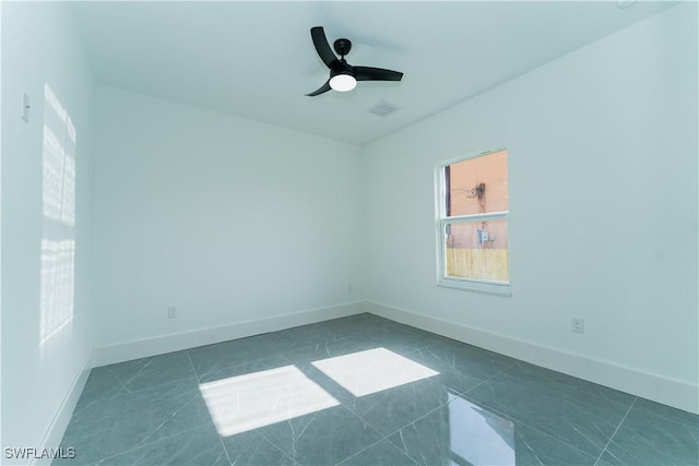 5308 4th St W, Lehigh Acres, FL 33971 - unfurnished room with a ceiling fan and baseboards