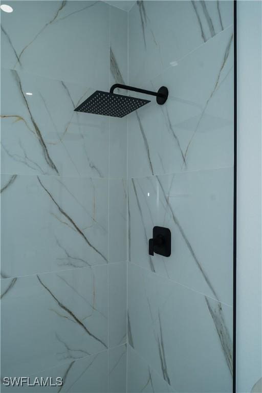 5308 4th St W, Lehigh Acres, FL 33971 - bathroom view of a marble finish shower