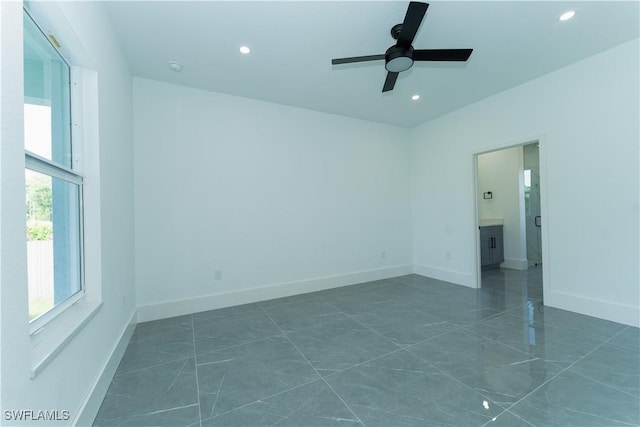5308 4th St W, Lehigh Acres, FL 33971 - unfurnished room with recessed lighting, a ceiling fan, and baseboards
