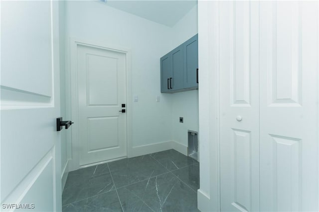 5308 4th St W, Lehigh Acres, FL 33971 - laundry area featuring cabinet space and electric dryer hookup
