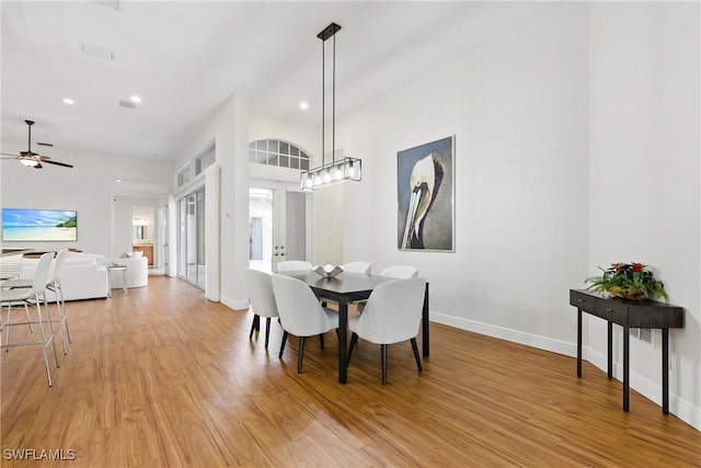 27549 Riverbank Dr, Bonita Springs, FL 34134 - dining room with light wood-style flooring, baseboards, a ceiling fan, and recessed lighting