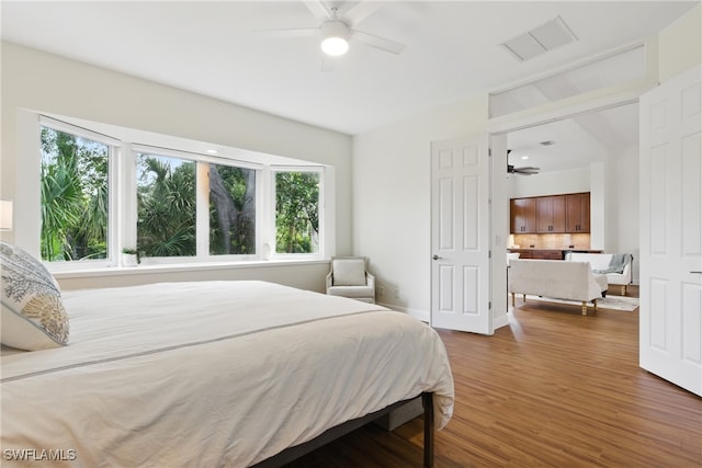 27549 Riverbank Dr, Bonita Springs, FL 34134 - bedroom featuring wood finished floors, ceiling fan, and visible vents