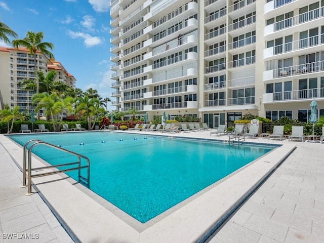 140 Seaview Ct Unit 1703N, Marco Island, FL 34145 - community pool with a patio
