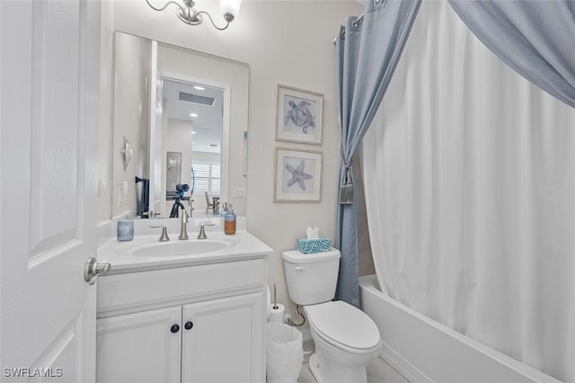 full bathroom featuring visible vents, toilet, vanity, and shower / bathtub combination with curtain