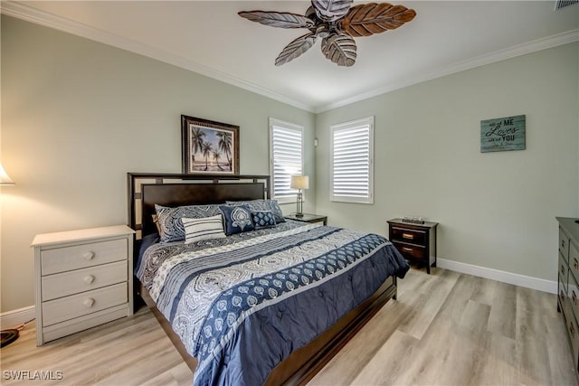 bedroom featuring ornamental molding, ceiling fan, light wood-style flooring, and baseboards