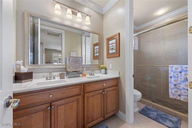 full bathroom with toilet, a sink, ornamental molding, and a shower stall