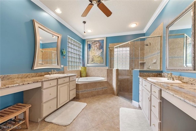 full bath with a sink, ornamental molding, a stall shower, and plenty of natural light