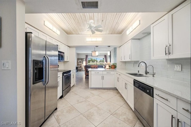 6025 Chardonnay Ln Unit 103, Naples, FL 34119 - kitchen with stainless steel appliances, visible vents, wooden ceiling, a sink, and ceiling fan