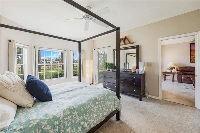 6025 Chardonnay Ln Unit 103, Naples, FL 34119 - carpeted bedroom featuring baseboards and ceiling fan