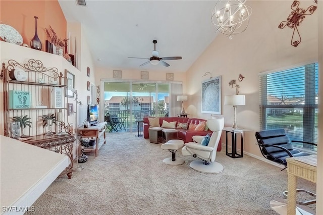 living room with carpet flooring, high vaulted ceiling, plenty of natural light, and a ceiling fan