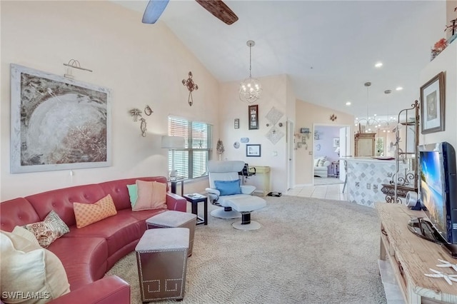 living room with a chandelier, high vaulted ceiling, carpet, ceiling fan, and tile patterned flooring