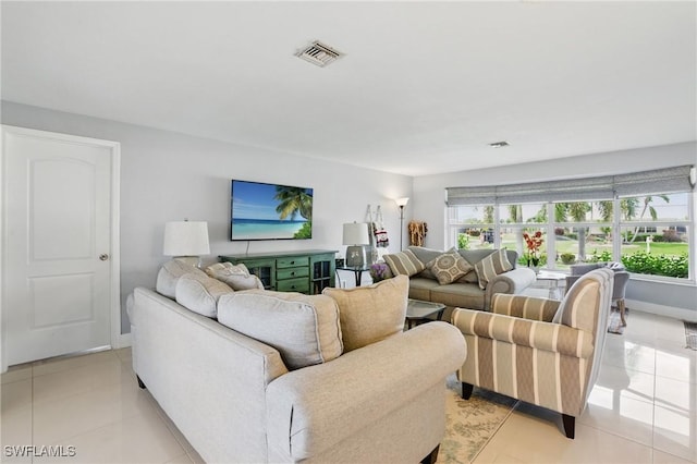 2941 SE 10th Pl, Cape Coral, FL 33904 - living area with plenty of natural light, light tile patterned floors, and visible vents