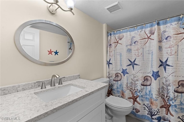 270 Naples Cove Dr Unit 3205, Naples, FL 34110 - full bath with toilet, vanity, visible vents, and a shower with shower curtain