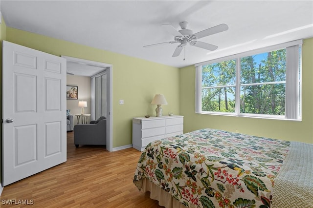 270 Naples Cove Dr Unit 3205, Naples, FL 34110 - bedroom featuring ceiling fan, light wood-style flooring, and baseboards