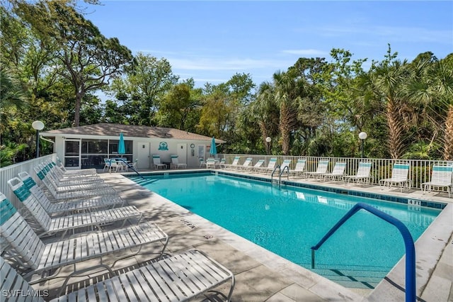 270 Naples Cove Dr Unit 3205, Naples, FL 34110 - community pool featuring a patio area and fence