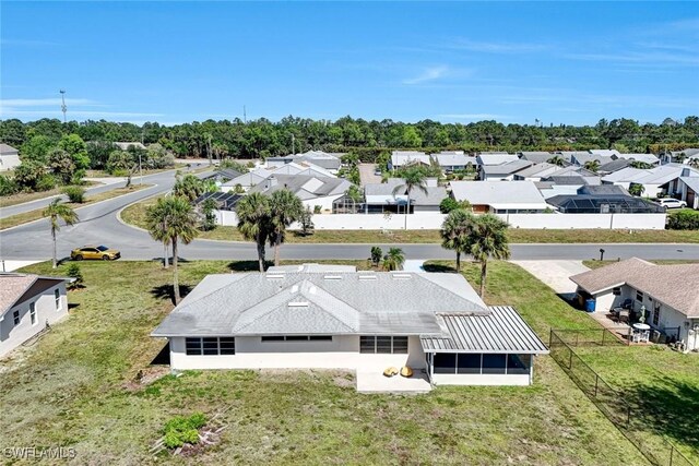 1423 Alwynne Dr, Lehigh Acres, FL 33936 - aerial view featuring a residential view