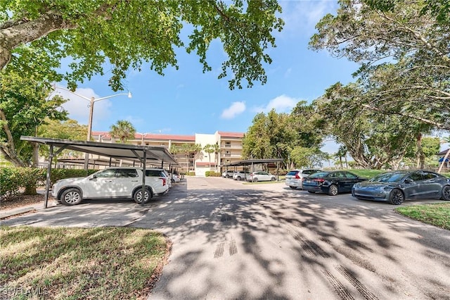 view of partially covered parking lot