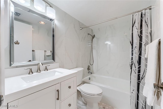 bathroom with vanity, toilet, shower / bathtub combination with curtain, and visible vents