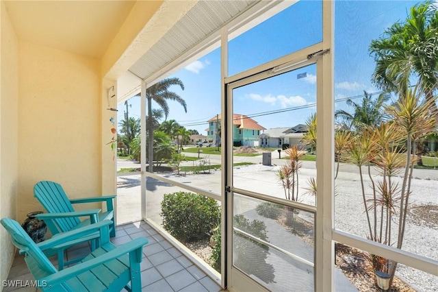 sunroom with a residential view