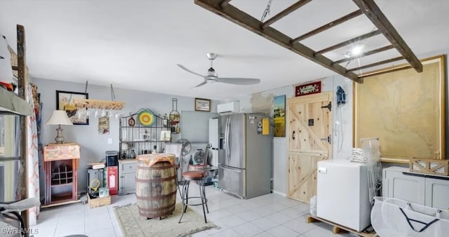 kitchen featuring ceiling fan, stainless steel refrigerator with ice dispenser, and light tile patterned floors