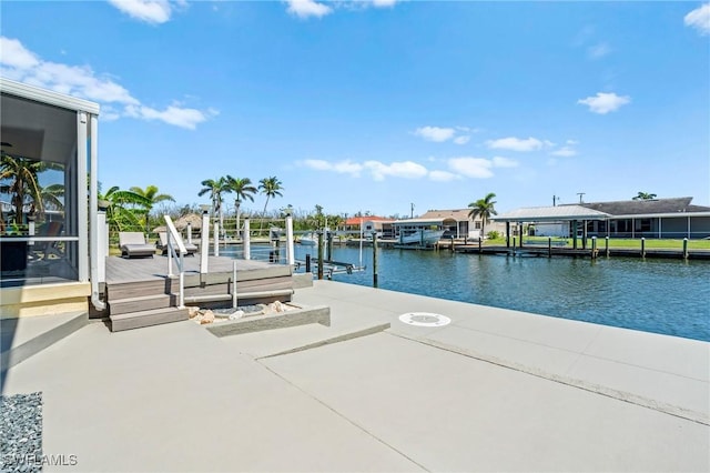 view of dock featuring a water view and boat lift