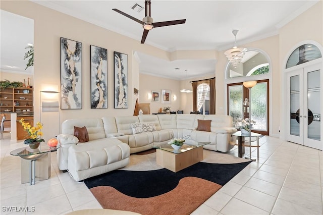 933 Barcarmil Way, Naples, FL 34110 - living area featuring a ceiling fan, ornamental molding, visible vents, light tile patterned flooring, and french doors