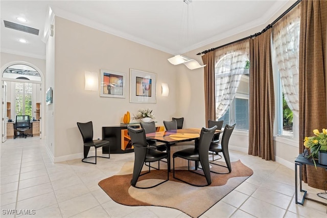 933 Barcarmil Way, Naples, FL 34110 - dining space featuring light tile patterned floors, baseboards, ornamental molding, and visible vents