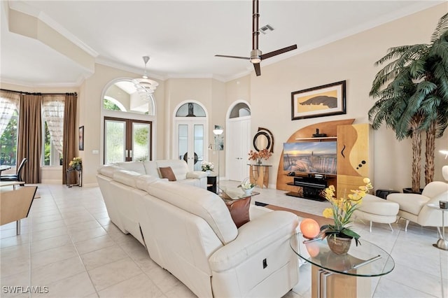 933 Barcarmil Way, Naples, FL 34110 - living area featuring visible vents, ceiling fan, crown molding, french doors, and light tile patterned flooring