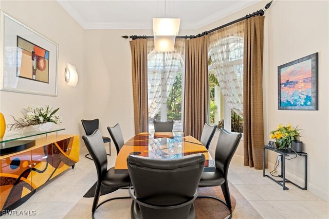 933 Barcarmil Way, Naples, FL 34110 - dining room with a wealth of natural light, baseboards, crown molding, and light tile patterned flooring