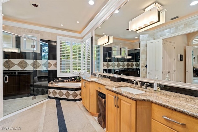933 Barcarmil Way, Naples, FL 34110 - full bathroom featuring a sink, ornamental molding, double vanity, a stall shower, and a garden tub
