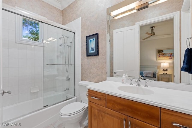 933 Barcarmil Way, Naples, FL 34110 - ensuite bathroom featuring toilet, ceiling fan, enclosed tub / shower combo, ensuite bath, and vanity