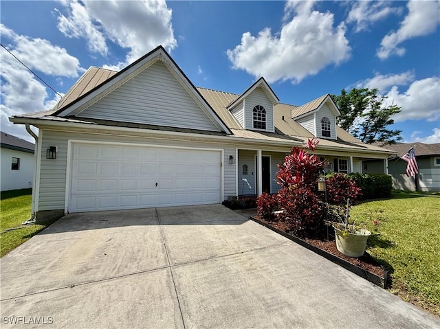 view of front of property with a front yard, concrete driveway, and an attached garage