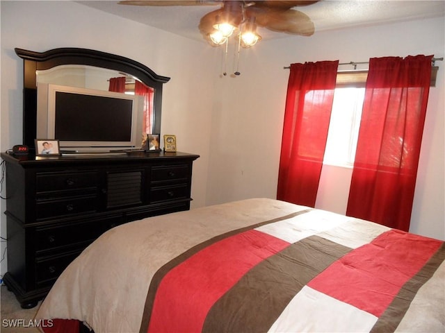 bedroom featuring a ceiling fan