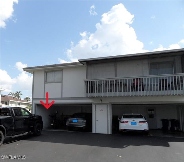 view of building exterior with an attached garage
