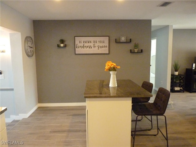 2138 Bahama Ave, Fort Myers, FL 33905 - dining space with wood finished floors and baseboards