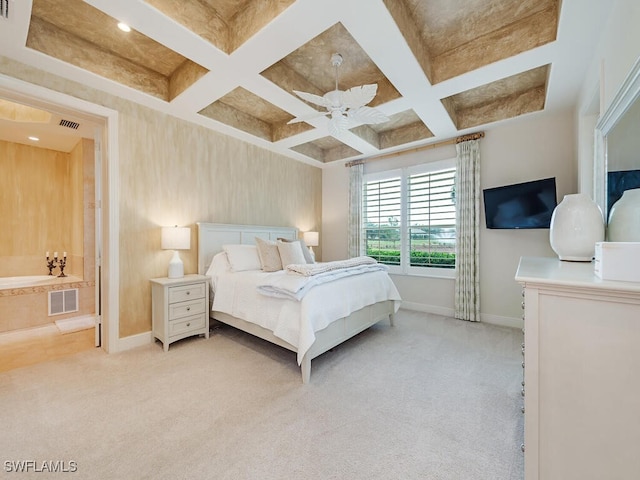 bedroom featuring baseboards, visible vents, and light carpet