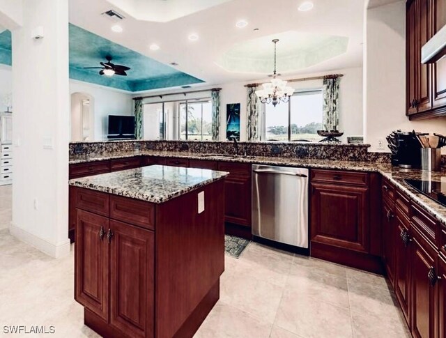 584 Avellino Isles Cir Unit 19102, Naples, FL 34119 - kitchen with dishwasher, a raised ceiling, a sink, a peninsula, and a ceiling fan